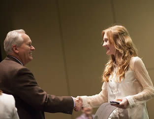 college-girl-shaking-hands-at-school