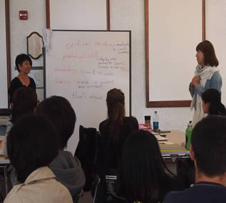 instructors speaking-to-college-class