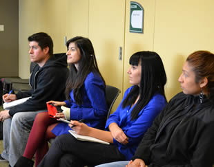 students-sitting-in-college-course