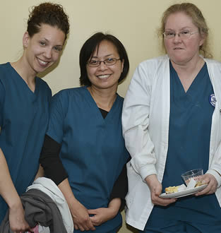 Group of nurses in scrubs at medical facility