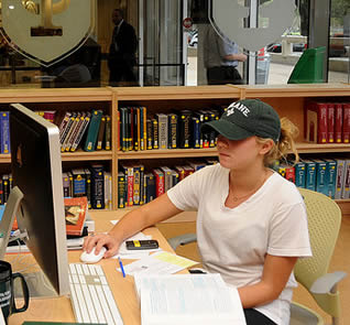 woman-college-student-working-on-computer