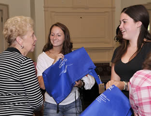 two-young-college-girls-with-elderly-woman