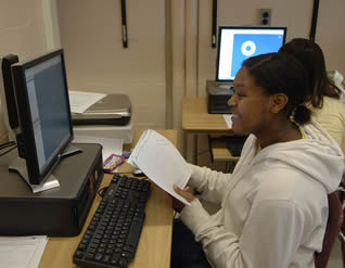 african-american-female-college-student-on-computer-450083882827877894323