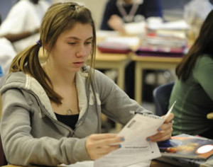 student-reading-assignment-in-class