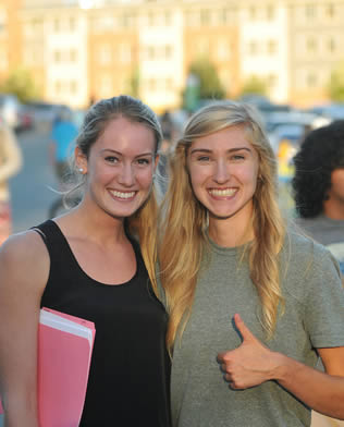 two-blonde-college-girls-thumbs-up
