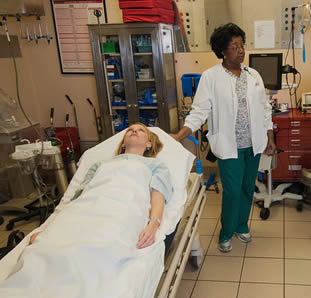 nursing assistant in exam room