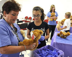 nurses-handing-out-teddy-bears