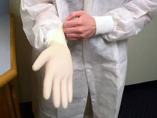 putting-on-medical-gloves-4402