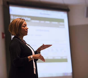 black-college-instructor-speaking-to-class