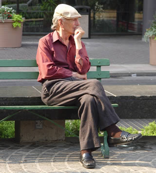 elderly-sitting-on-bench-722