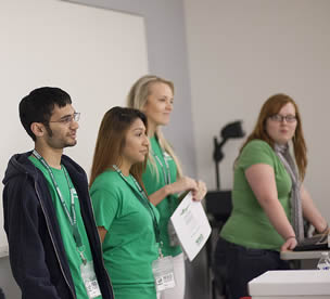 group-of-students-giving-presentation-in-college