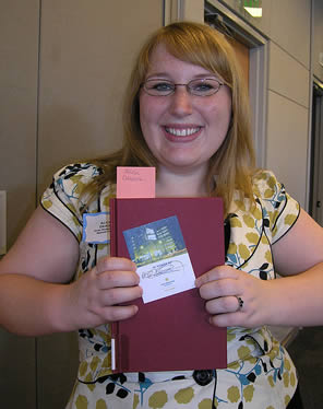 student-holding-book