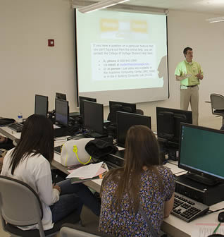 students-listening-to-college-professor