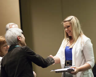 blonde-college-student-shaking-hands