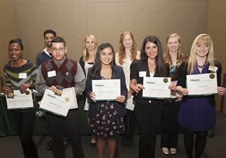 college-students-holding-diplomas