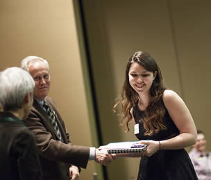 smiling-college-girl-receiving-packet