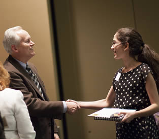 young-college-female-getting-award