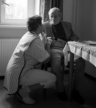 caregiver-talking-to-resident-6699