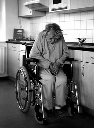 elderly-woman-in-wheelchair-at-nursing-home-333