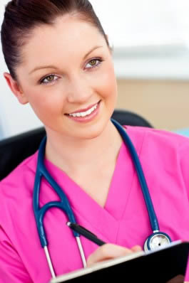 smiling-nurse-aide-with-clipboard