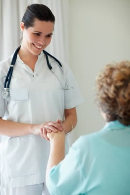 young-nurse-aide-with-patient