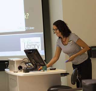 instructor-making-presentation-to-classroom