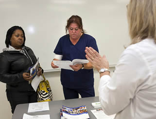 nursing-students-talking-to-instructor