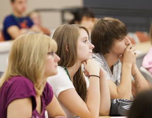 students-sitting-in-college-room