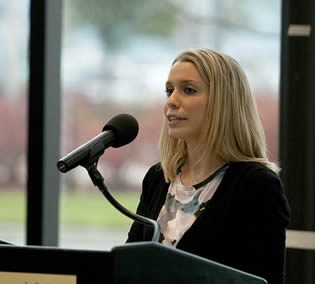 woman-speaking-at-college-event