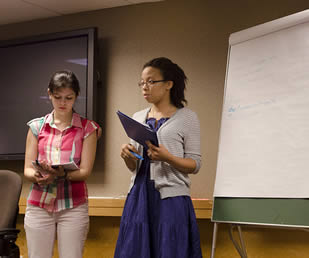 college-students-giving-presentation-to-class