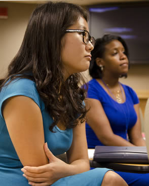 college-students-listening-to-instructor