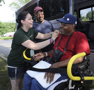 medical-care-giver-with-disabled-man