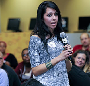 student-speaking-in-college-class