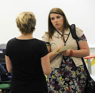 student-speaking-with-instructor