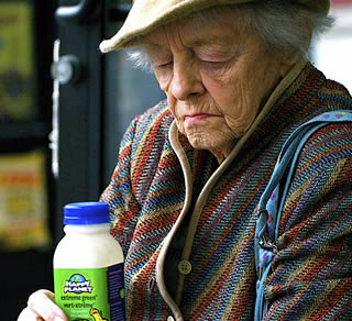 elderly-lady-with-bottle-of-juice-9992