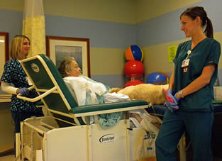 nurse-aides-assisting-patient-6677