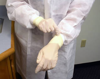 putting-medical-gloves-on-68272