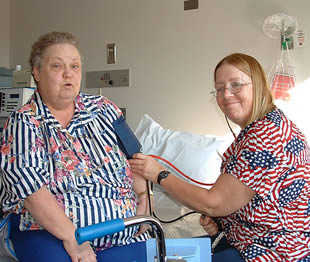taking-blood-pressure-of-patient-00234
