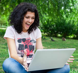 college-woman-with-laptop-computer