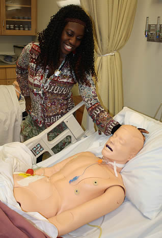 health-care-student-with-training-dummy