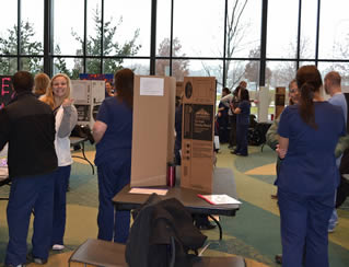 group-of-medical-students-in-scrubs-at-school-event