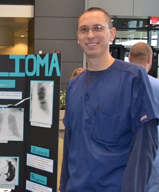 medical-student-in-scrubs-showing-presentation