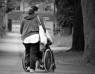 care-worker-with-elderly-in-wheelchair