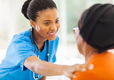 Geriatric nursing assistant with elderly patient