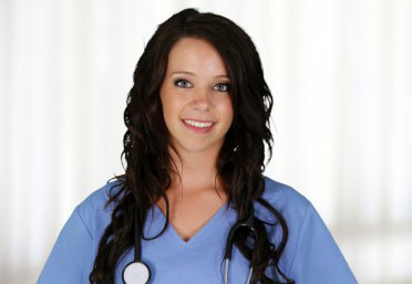CNA employee in scrubs at work