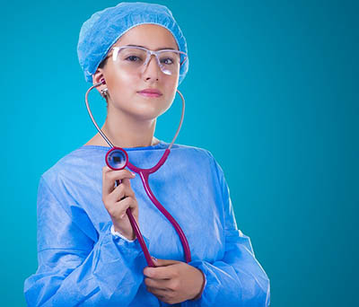 Nursing assistant in scrubs on the job